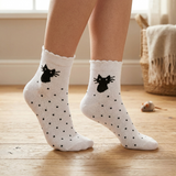 WOMEN CAT